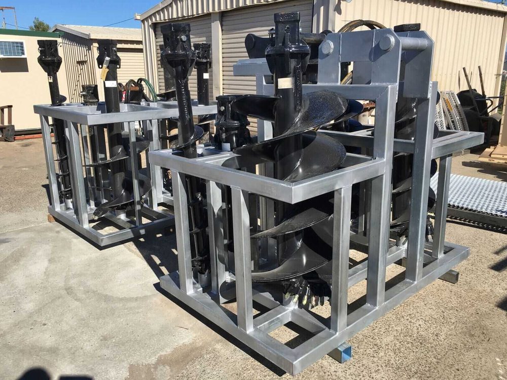 Steel auger storage cages custom fabricated for earth moving attachments