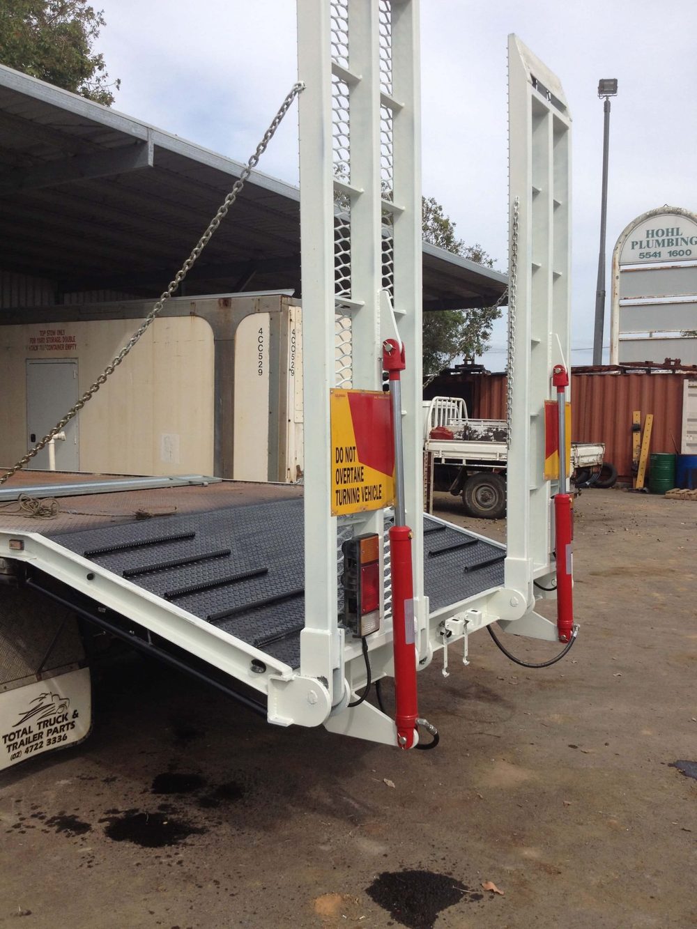 Custom beaver tail trailer fabricated for transport industry