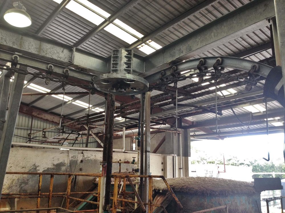 Automated chain rail system fabricated for industrial hide processing plant